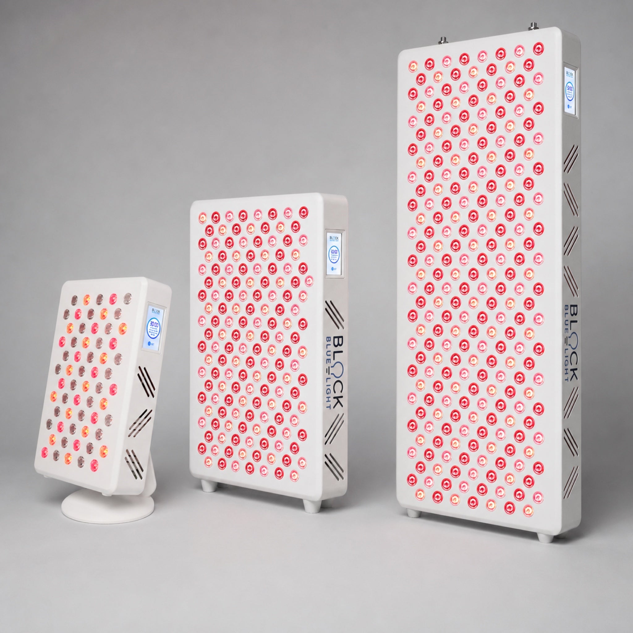 BlockBlueLight PowerPanel TABLETOP, PRO, and MEGA panels on a light gray studio background