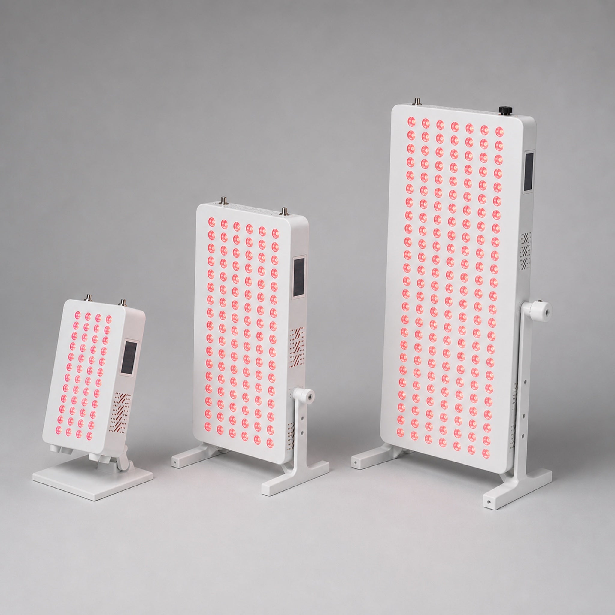 Luscent Red Portable, Luscent Red Large, and Luscent Red Full Body panels in white on a light gray studio background