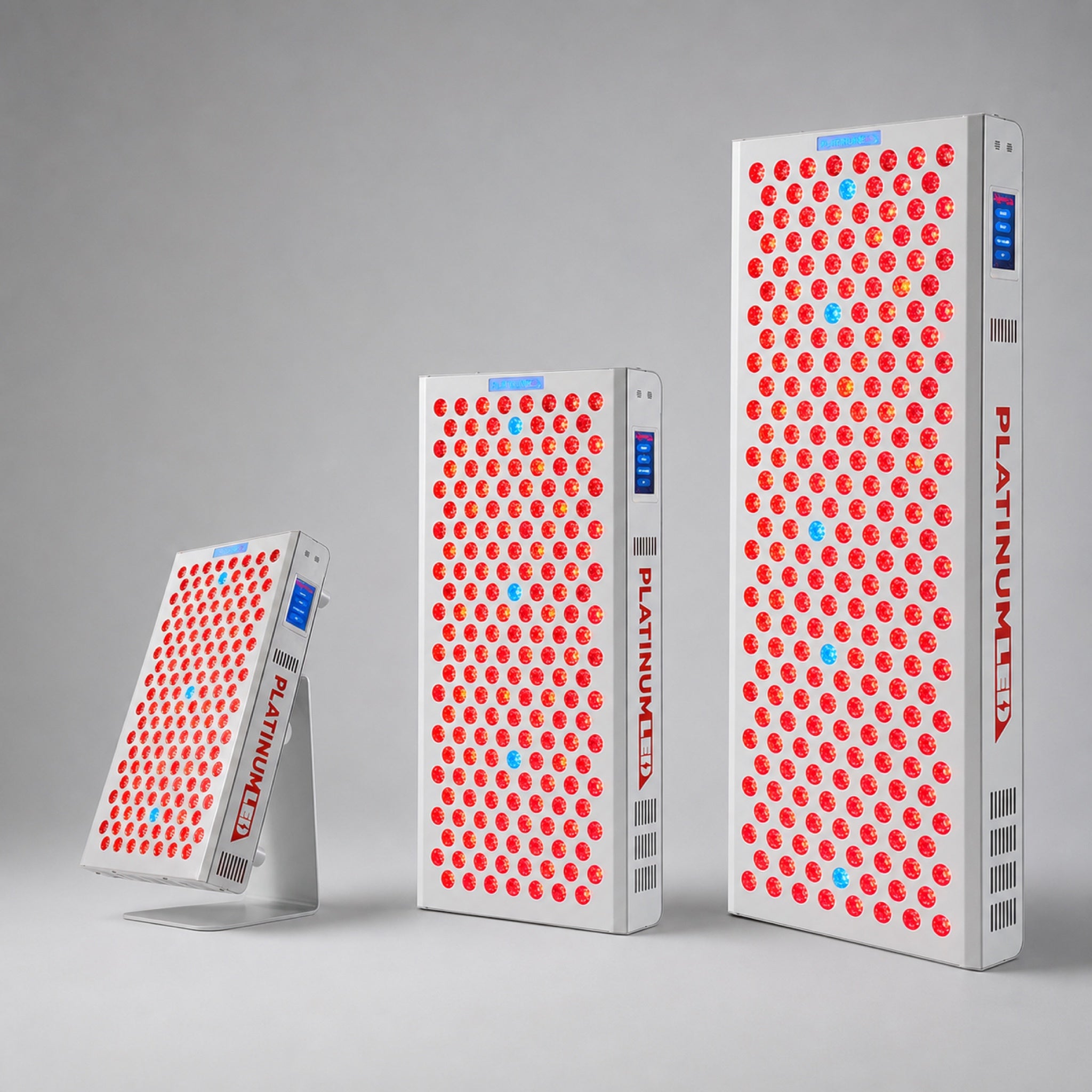 PlatinumLED BIOMAX 300 with tabletop stand, BIOMAX 450, and BIOMAX 900 on a light gray studio background